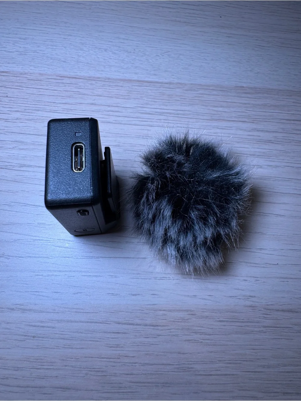 DJI Mic 1 transmitter and Gray Furry Wind Muff